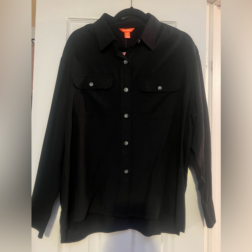 Simple black button down shirt with full length sleeves